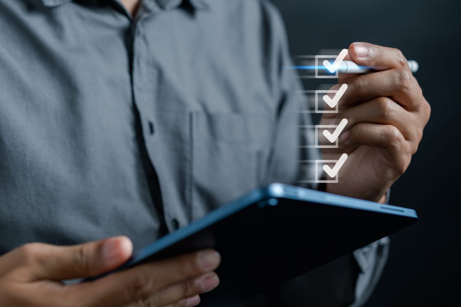 An image showing a close up of a person using a tablet